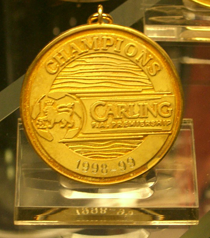 The English Premier League Winners' Medal (Manchester United Museum) - edwin.11 - CC BY 2.0